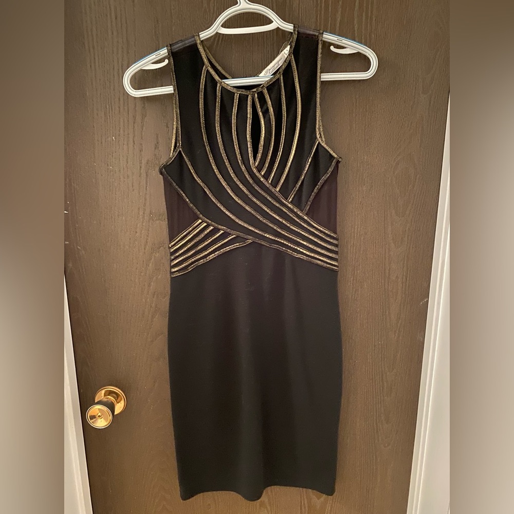 Short black and gold dress by Spicysugar.